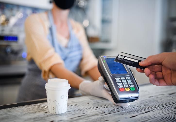 Contactless payment coffee shop shutterstock_1734234314