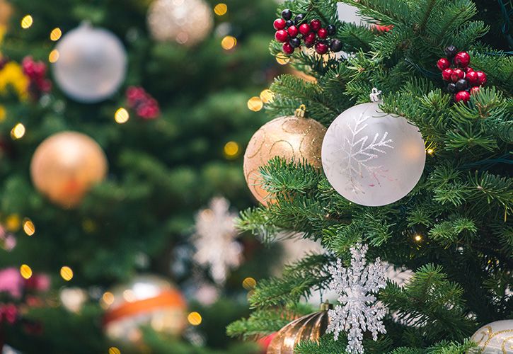 tilt-shift-photography-of-green-christmas-tree-with-baubles-1723679