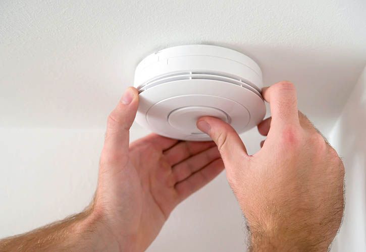 Fire alarm smoke alarm AlexRaths iStock-869078370