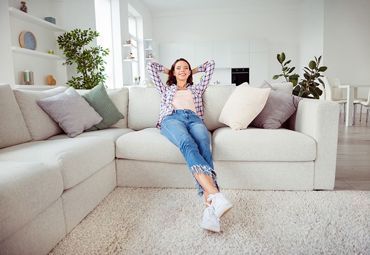 Woman home furnishings interiors shutterstock_1410785345