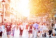 Shoppers blurred street spring summer Cunaplus_M.Faba iStock-1087671624