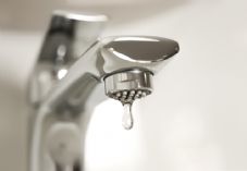 Dripping tap water shutterstock_1899478384