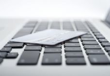 Laptop and card - NCR - shutterstock_116422102 725 x 500