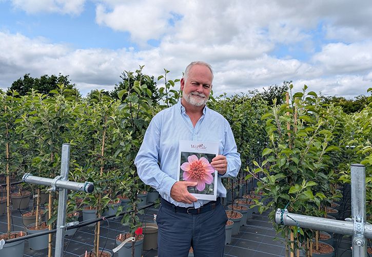 Andy Johnson, MD, Wyevale Nurseries, with the 2026 Retailers Catalogue