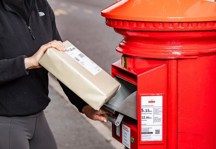 SWNS Royal Mail postbox parcel