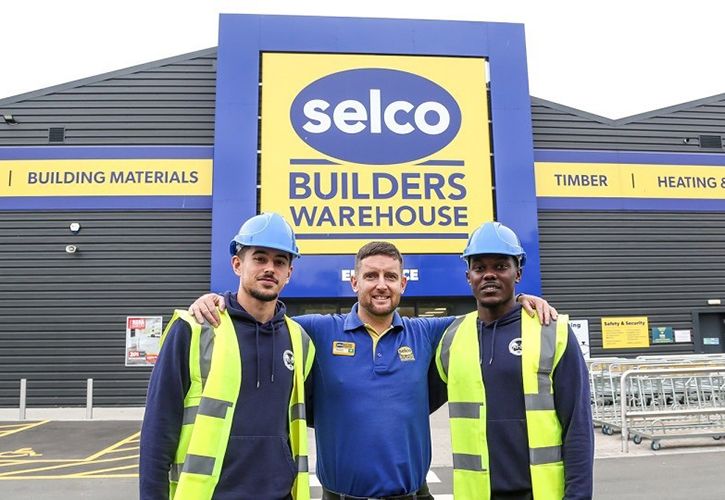 Selco staff and customers outside store (corporate)