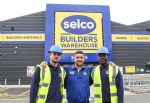Selco staff and customers outside store (corporate)