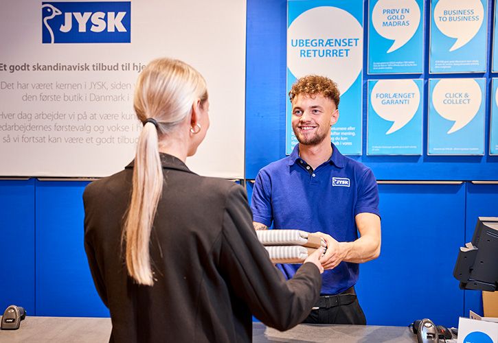 JYSK staff member and customer (corporate)