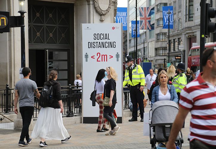 Shoppers social distance mask covid19 I. Salci Shutterstockdotcom1756835096.jpg